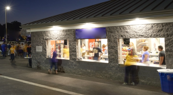 Image of a concessions stand outside of a school.